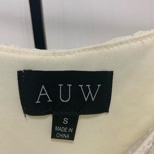 Lace high/low sleeveless dress-off white color